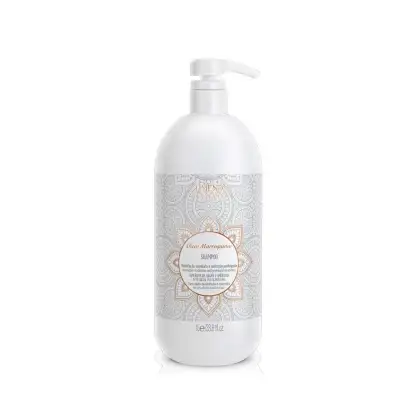 Frasco branco com bomba dosadora contendo shampoo da marca Amend Cosméticos. Rótulo com design ornamental em tons de cinza e dourado, indicando o nome do produto "Óleo Marroquino".