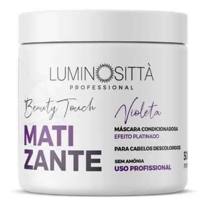Matizante violeta da marca Luminosittà. Sua embalagem é branca, com detalhes em violeta. Também é destacado que é um uso profissional e que não contém amônia em sua fórmula.