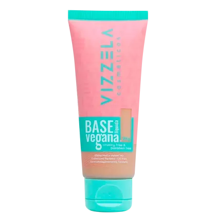 Tubo de base vegana da marca Vizzela, com embalagem rosa e verde, contendo informações sobre ser livre de crueldade e parabenos. O produto é apresentado em um recipiente de plástico com tampa.