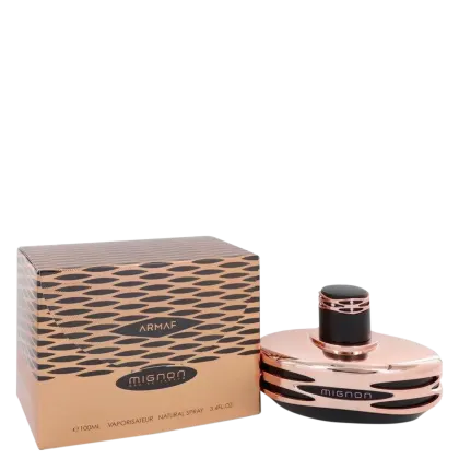 Frasco de perfume Armaf Mignon em caixa com padrão geométrico em tons de marrom e preto. O frasco possui formato arredondado com tampa preta e detalhes em rosa dourado.