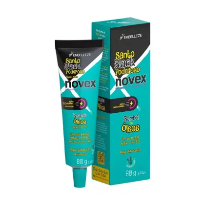 A imagem mostra a caixa e bisnaga da Máscara Capilar Novex Santo Black Poderoso Recarga de Óleos 80g, da Embelleze. O produto é apresentado em uma embalagem verde e preta com detalhes em amarelo. Destaca "Ação instantânea" e "Recarga de Óleos".