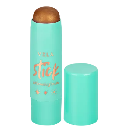 Bastão de iluminador da marca Vizzela, em embalagem cilíndrica de cor verde-menta com detalhes em laranja, exibindo o nome "Stick" e efeitos de "shine & glow".