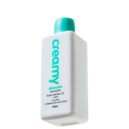 A imagem mostra um frasco de tônico antiacne retangular branco com tampa verde.