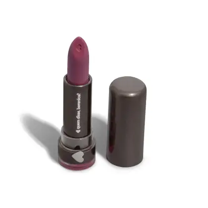 Batom da marca Quem Disse, Berenice? em embalagem preta com detalhes em coração, com cor rosa escuro na ponta do produto.