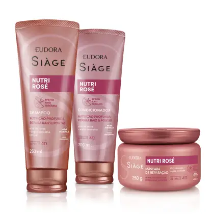 Shampoo, condicionador e máscara lado a lado, embalagens em tons de rosé.