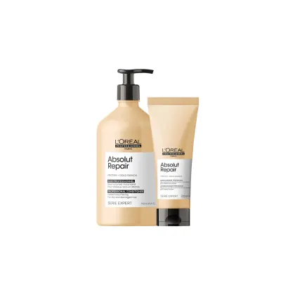 Conjunto de produtos da linha Absolut Repair da L'Oréal Professionnel, composto por um frasco de condicionador e um tubo de creme, ambos com embalagem em tons de bege e preto, destacando os ingredientes de proteína e quinoa dourada.