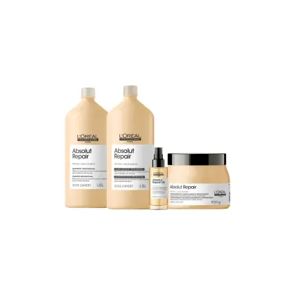 A linha de produtos Absolut Repair da L'Oréal Professionnel, composta por shampoo, condicionador, óleo e máscara, em embalagens de plástico e vidro de tons claros e rótulos com o nome da linha.