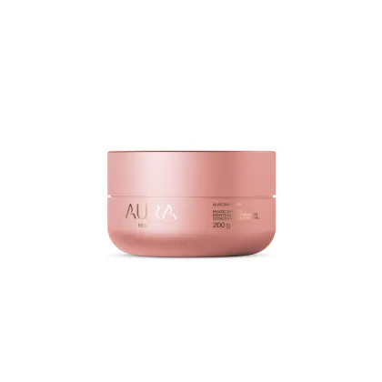 Pote rosa de 200g da linha Aura Beauty, contendo a descrição "Magic Butter Moisturizing Cream" em sua embalagem. O produto apresenta um design minimalista e elegante, com a marca Aura Beauty destacada em letras douradas.