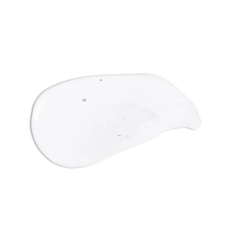Textura branca e gelatinosa de shampoo suave da marca Boti Baby com aparência fluída e brilhante, espalhada em superfície branca.