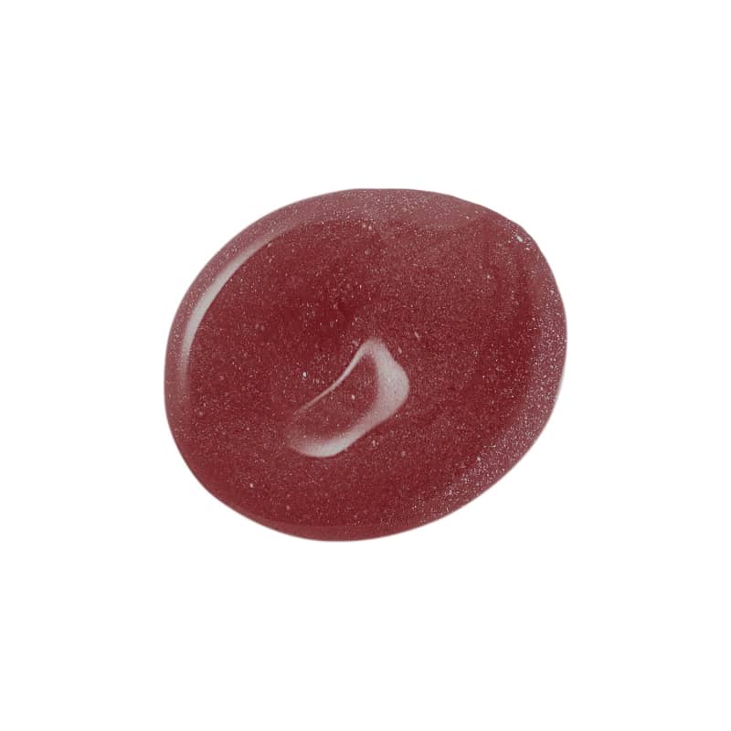 Textura gelatinosa e de cor marrom do gloss labial na cor Marrom Nude 115 da marca Intense, com aparência brilhante e de alta pigmentação, espelhada sobre superfície branca.