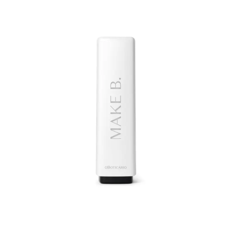 Tubo preto e branco com letras cinza do balm labial vermelho da marca Make B. Lip Chronology Color Repair.