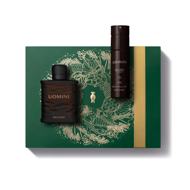 Imagem do Kit Presente Natal Uomini que traz um frasco de vidro marrom com tampa preta de desodorante colônia, um frasco cilíndrico marrom de body spray e uma caixa presenteável verde com estampa natalina.