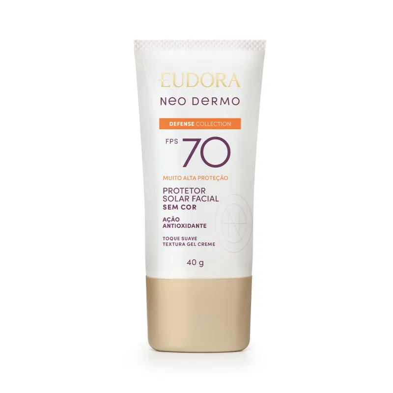 O produto apresentado é um protetor solar facial da linha Neo Dermo da marca Eudora, com FPS 70 e alta proteção. A embalagem é um tubo de cor bege, com rótulo branco e detalhes em roxo.
