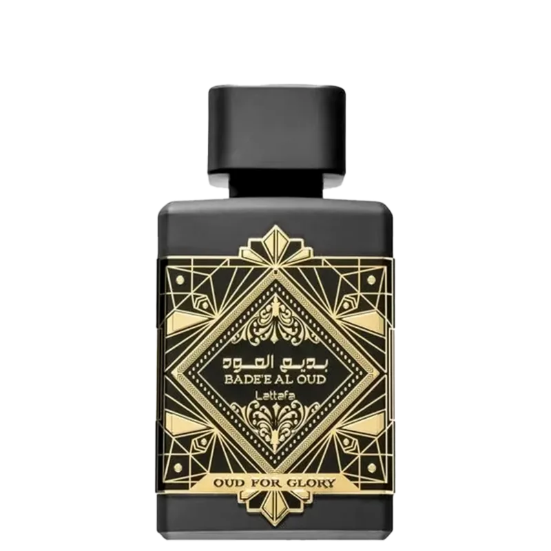 Frasco de perfume preto e dourado da marca Lattafa Perfumes, com rótulo em estilo art déco exibindo o nome "Badeeal Oud" e a descrição "Oud for Glory". O design é elegante e sofisticado, com detalhes decorativos dourados.