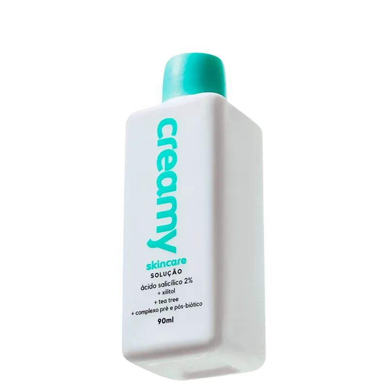 A imagem mostra um frasco de tônico antiacne retangular branco com tampa verde.