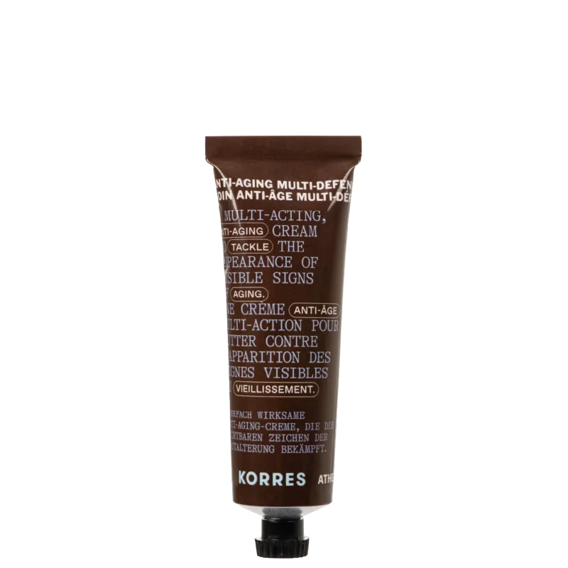 Tubo de creme anti-envelhecimento multi-ação da marca Korres, com rótulo marrom destacando seus benefícios e ingredientes. O produto promete combater os sinais visíveis do envelhecimento.