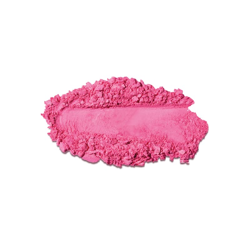 Textura de sombra em pó compacta rosa, com acabamento aveludado e brilho sutil, em superfície irregular e granulada.