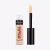 O produto mostrado é um Infallible Full Coverage Concealer da L'Oréal Paris, em um frasco preto com rótulo branco e preto. O produto é um corretivo líquido com aplicador tipo pincel para cobertura total.