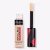 O produto apresentado é um Infallible Full Coverage Concealer da L'Oréal Paris, em um frasco de plástico transparente com rótulo preto e vermelho. O produto possui uma escova aplicadora preta e promete cobertura completa.