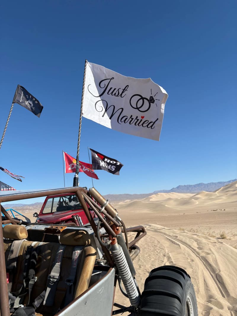Customer photo: custom flags flying on a sandrail in the sand dunes