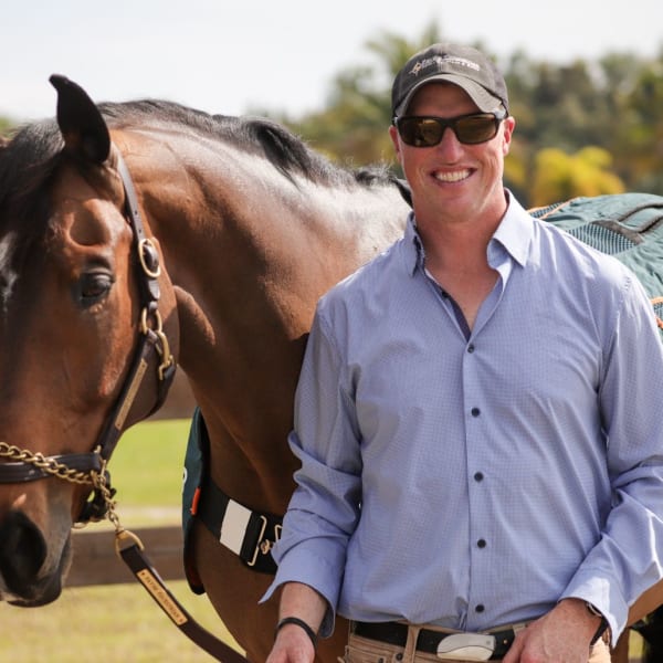 Doug Payne posing with his horse
