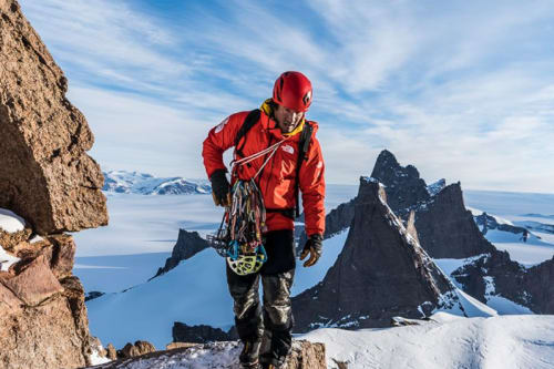 Jimmy Chin on top of a Mountain