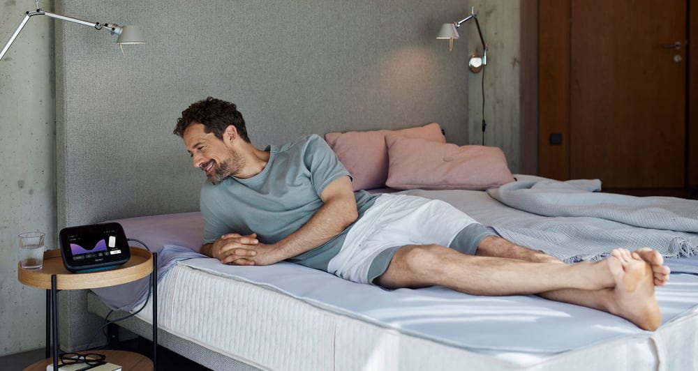 Breathable, flexible, ergonomic. – man in bedroom with B.Bed