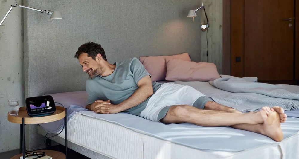 Breathable, flexible, ergonomic. – man in bedroom with B.Bed