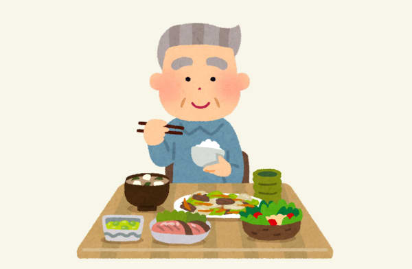 ご飯を食べる高齢者
