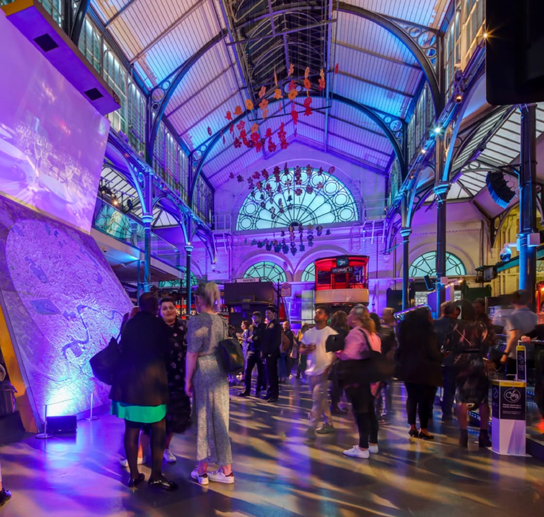 People standing an chatting in the event space