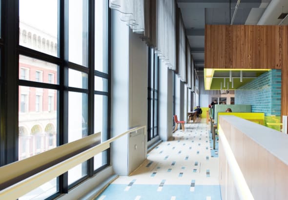 People sitting at tables in the cafe