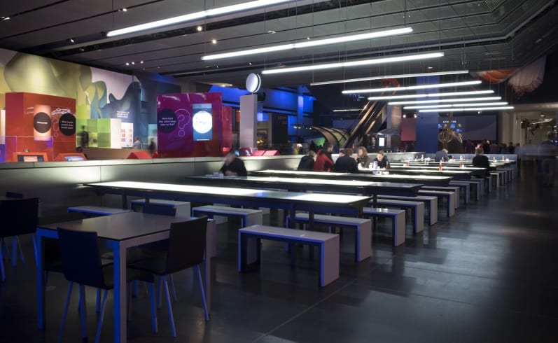 People sitting down to eat and drink in the cafe