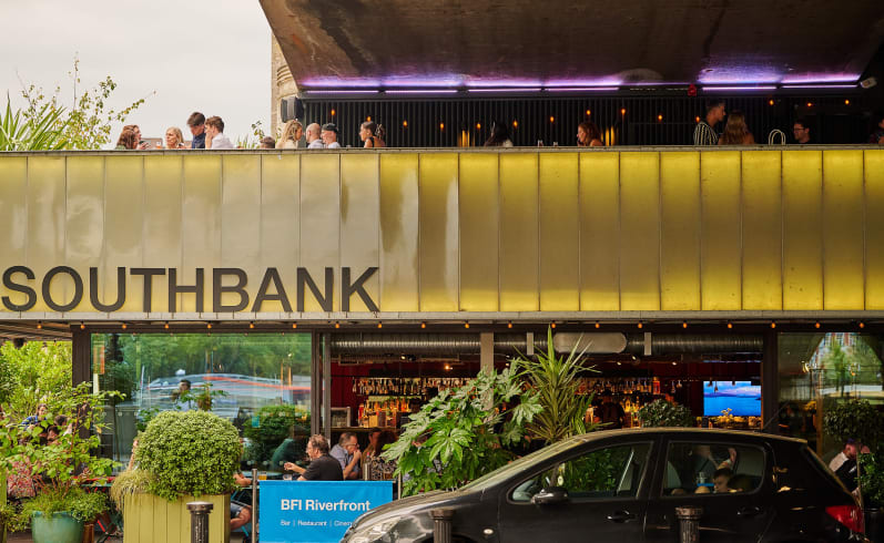 BFI Southbank Riverfront Events, Scene of people celebrating at an event on a balcony