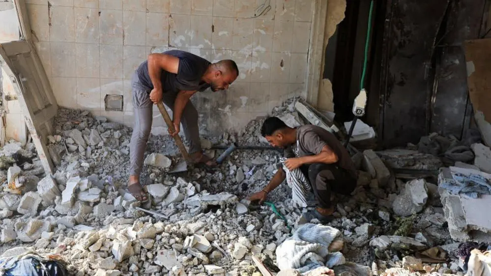 At least 13 killed in Israeli strikes on Gaza after Hamas agree disarmament deal