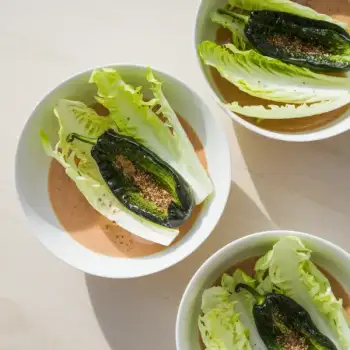 Charred Shishito Pepper & Frisée Salad with Miso-Ginger Dressing