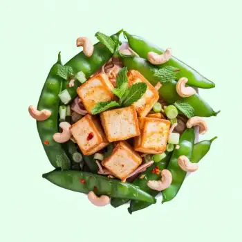 Golden Tofu with Toasted Cashews and Ginger Snap Peas