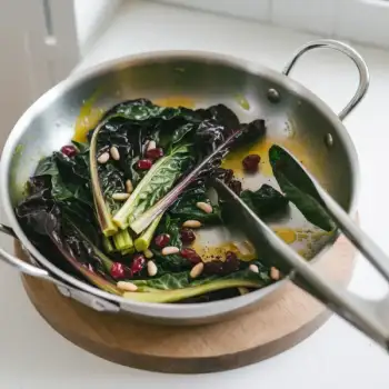 Sautéed Swiss Chard with Currants and Pine Nuts