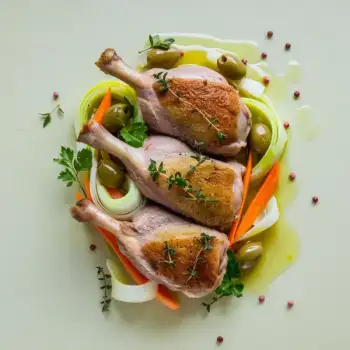 Herb-Infused Duck Legs with Leeks & Marinated Olives