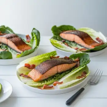 Seared Salmon and Romaine Hearts with Avocado Caesar Dressing