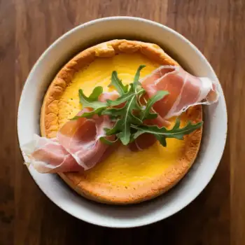 Cheddar Soufflé with Prosciutto and Arugula