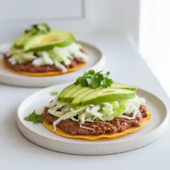 Breakfast Tostadas with Refried Black Beans and Cabbage Slaw