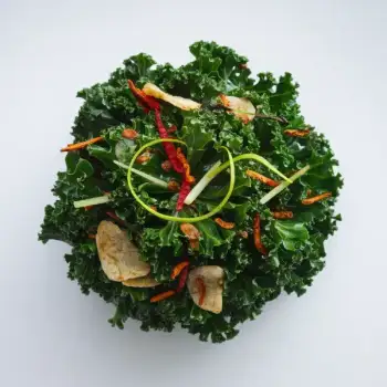 Sautéed Kale with Shallot, Ginger, Chili Crisp, and Lime
