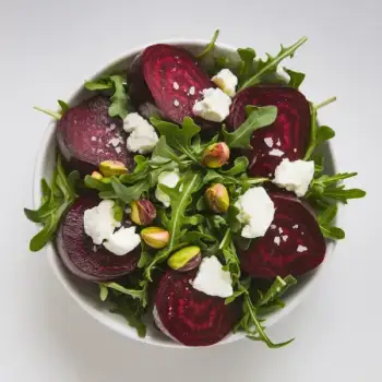 Ruby Red Beet and Arugula Salad with Crumbled Goat Cheese and Pistachios