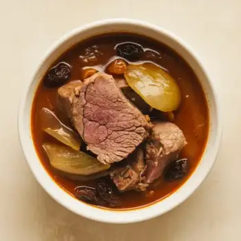 Aromatic Lamb Stew with Golden Onions and Raisins