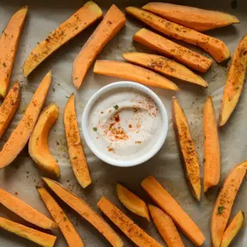 Spiced Sweet Potato Oven Fries with Harissa Yogurt Sauce