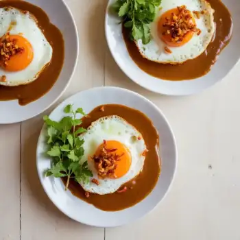 Fried Eggs with Chiles, Tamarind Sauce, and Crispy Shallots