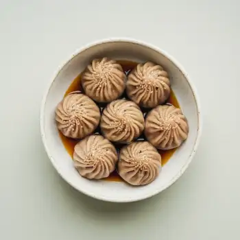 Sweet Sesame Glutinous Rice Dumplings in Syrup