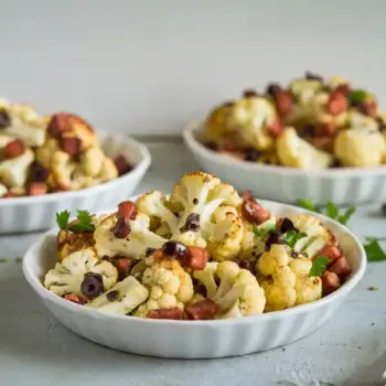 Crispy Cauliflower with Pancetta, Olive Dressing, and Parmesan Crust