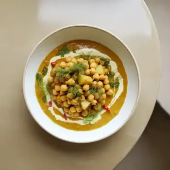 Curried Chickpea, Potato, and Fennel Delight with Zesty Cilantro Drizzle