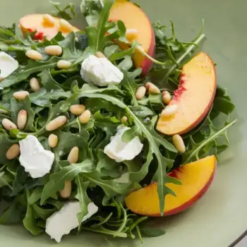 Peach and Arugula Salad with Toasted Pine Nuts and Goat Cheese
